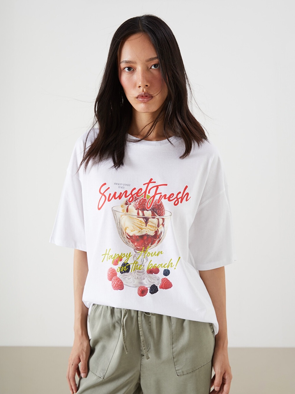 Sunset Fresh Amalfi Coast White Graphic T-Shirt with Fruit Design